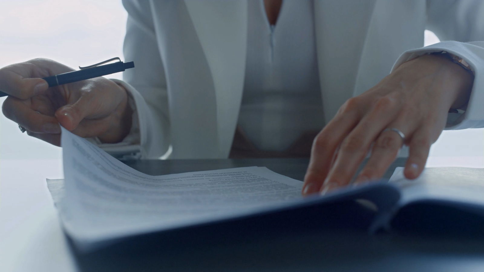Wrongful Dismissal Cases: What to Expect and How to Prepare 6 01 businesswoman hands checking contract closeup lawyer reading legal documents in sui SBV 347069833 4K 00.00.15.481 scaled