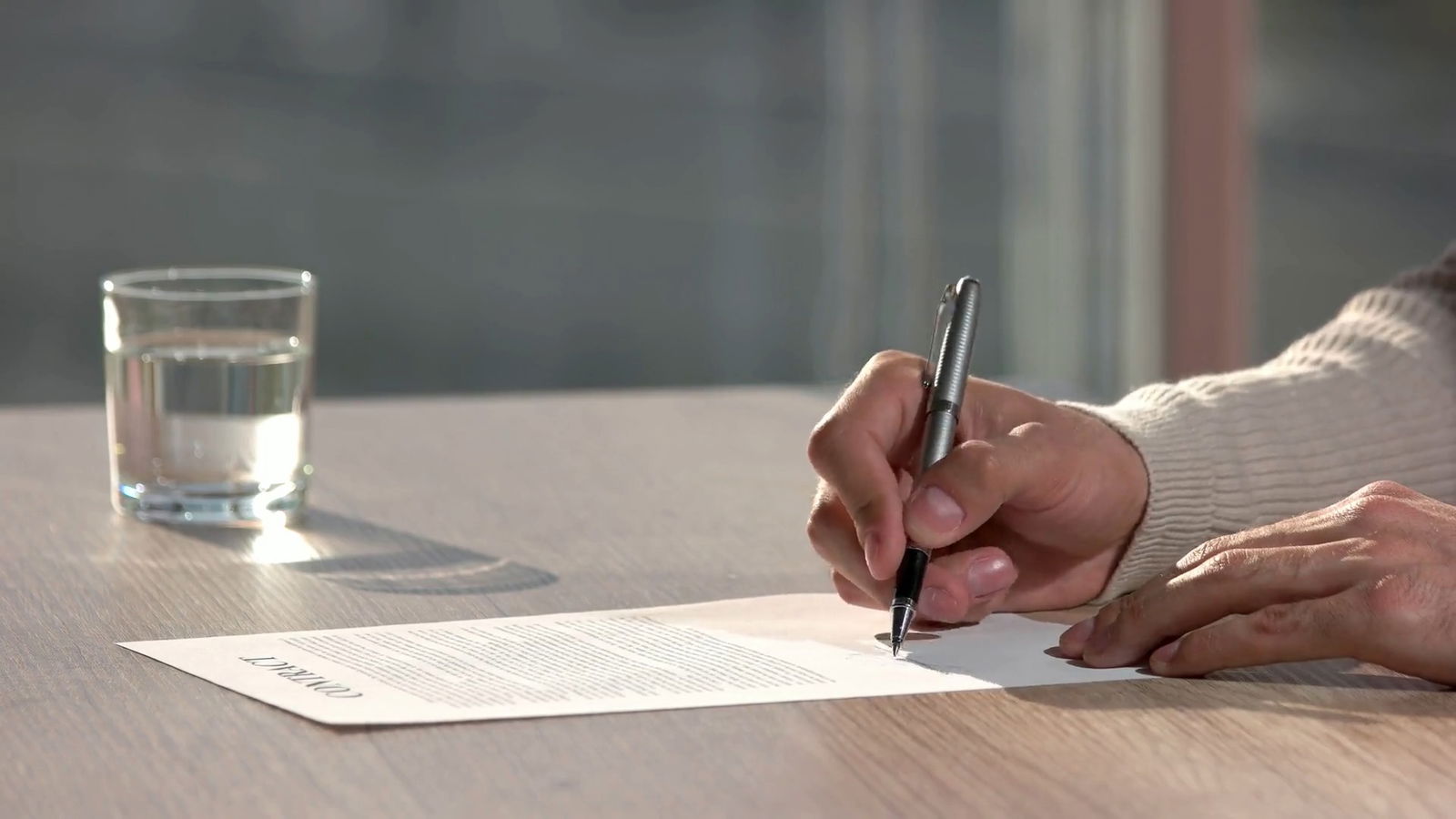 The Closure Letter: What Employers Need to Share After a Harassment Investigation 2 Person writing a letter.