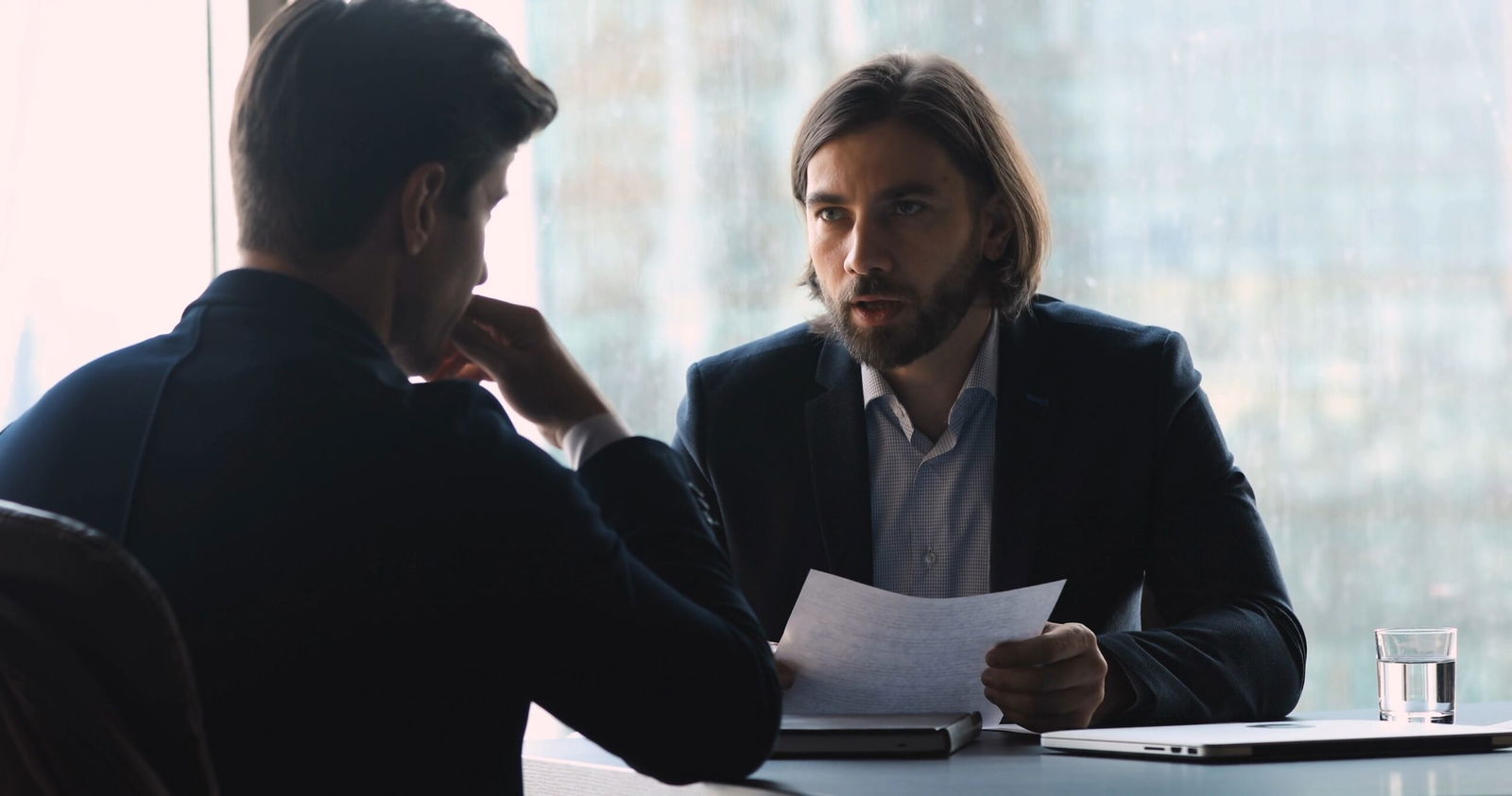 Are You Worried Your Trauma Makes You Look Unreliable in a Legal Investigation? 1 Employee in formal interview being assessed for credibility